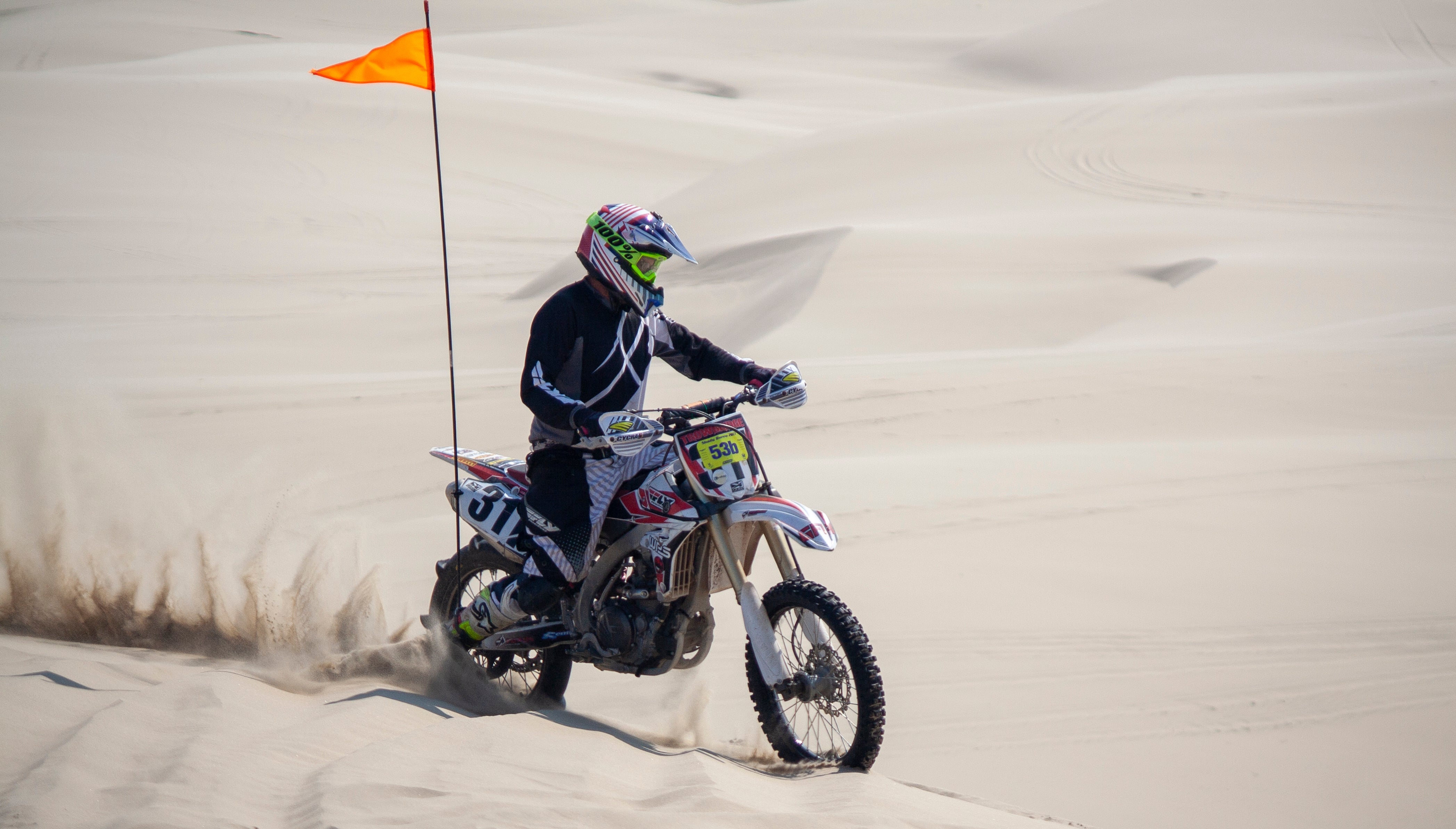 dirt bike in sand dunes